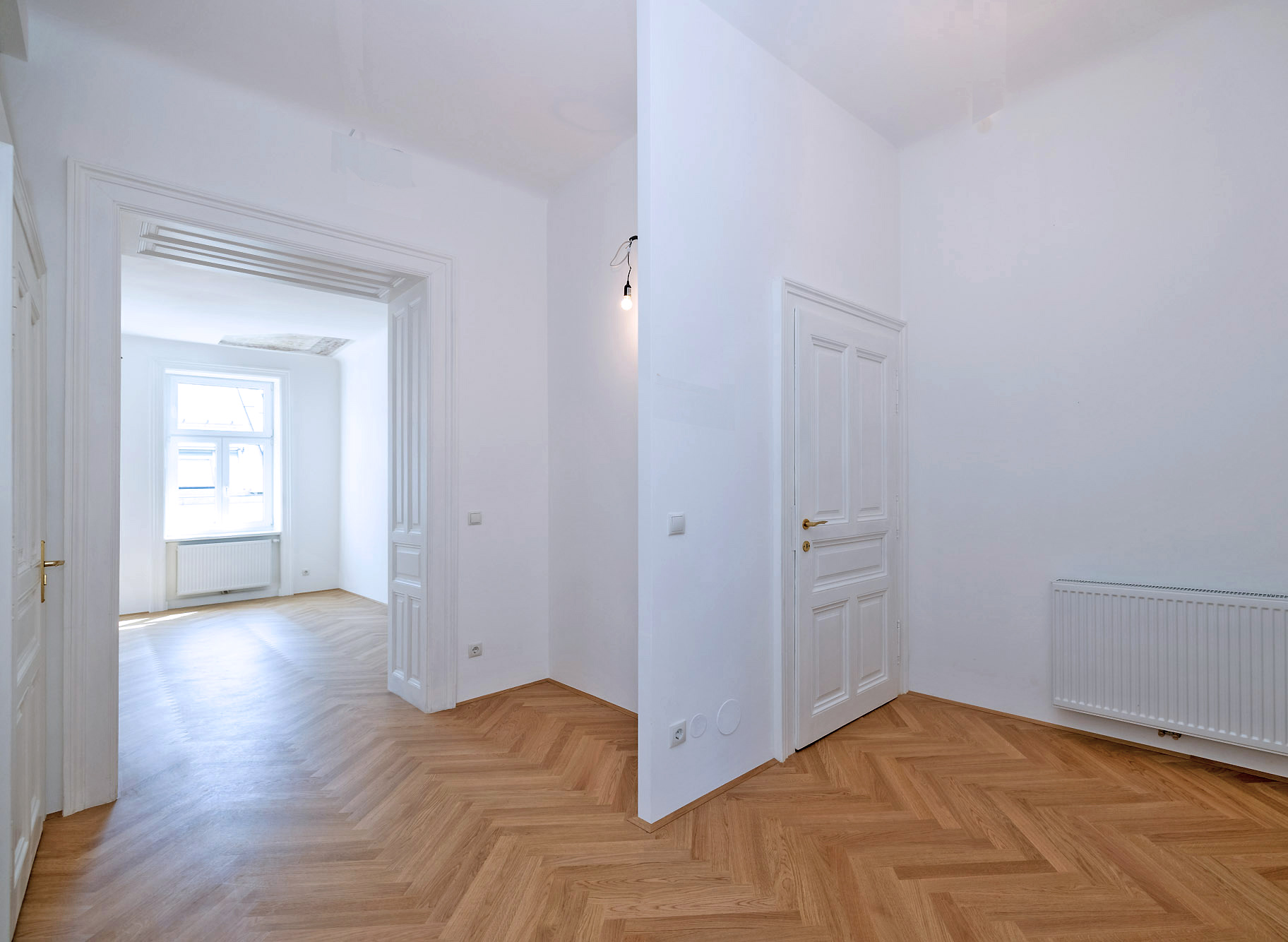 Umbau und Neugestaltung Mietwohnung A, Durchblick Vorraum zu Wohnzimmer